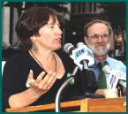 Alice Perry speaking at a press conference.
